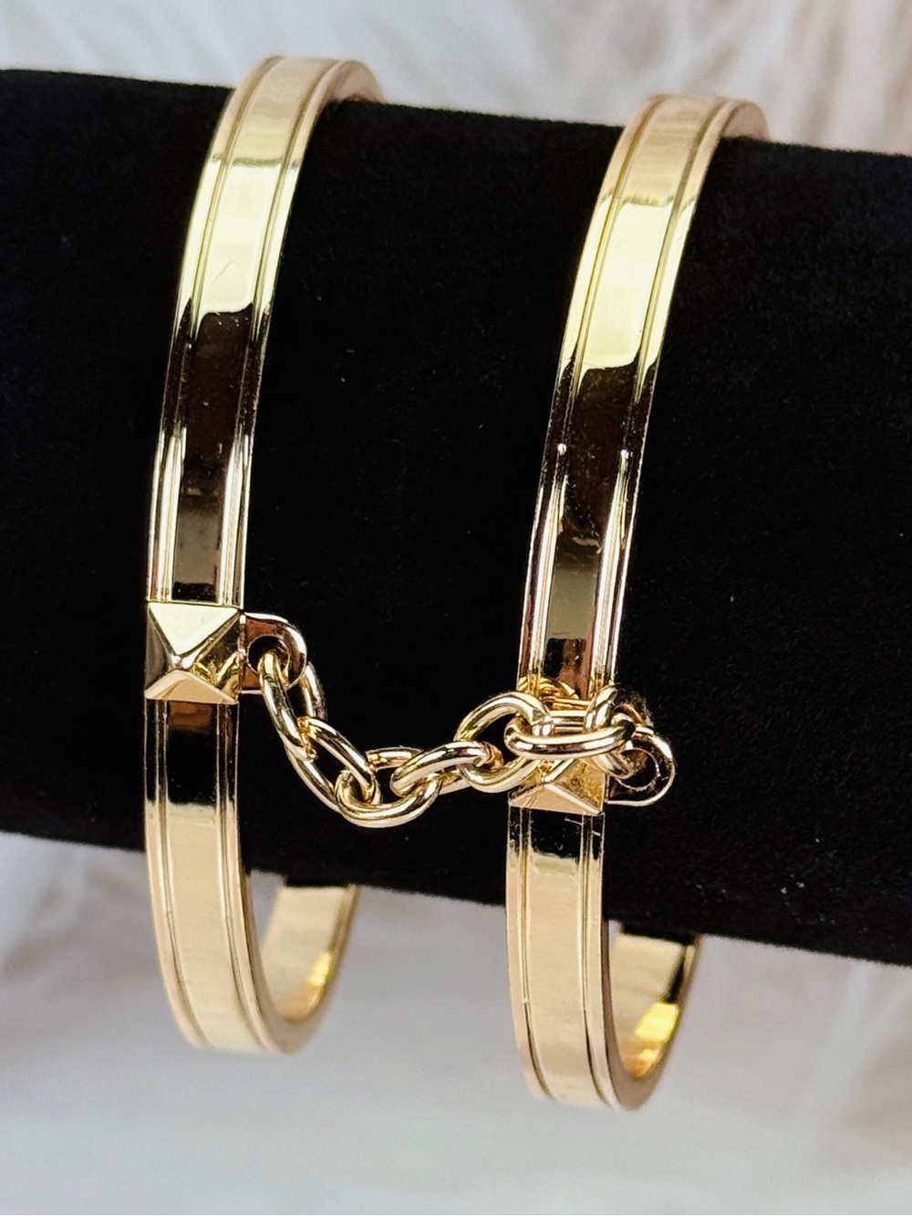 Victoria Secret goldtone, bangle set connected via chain bracelet